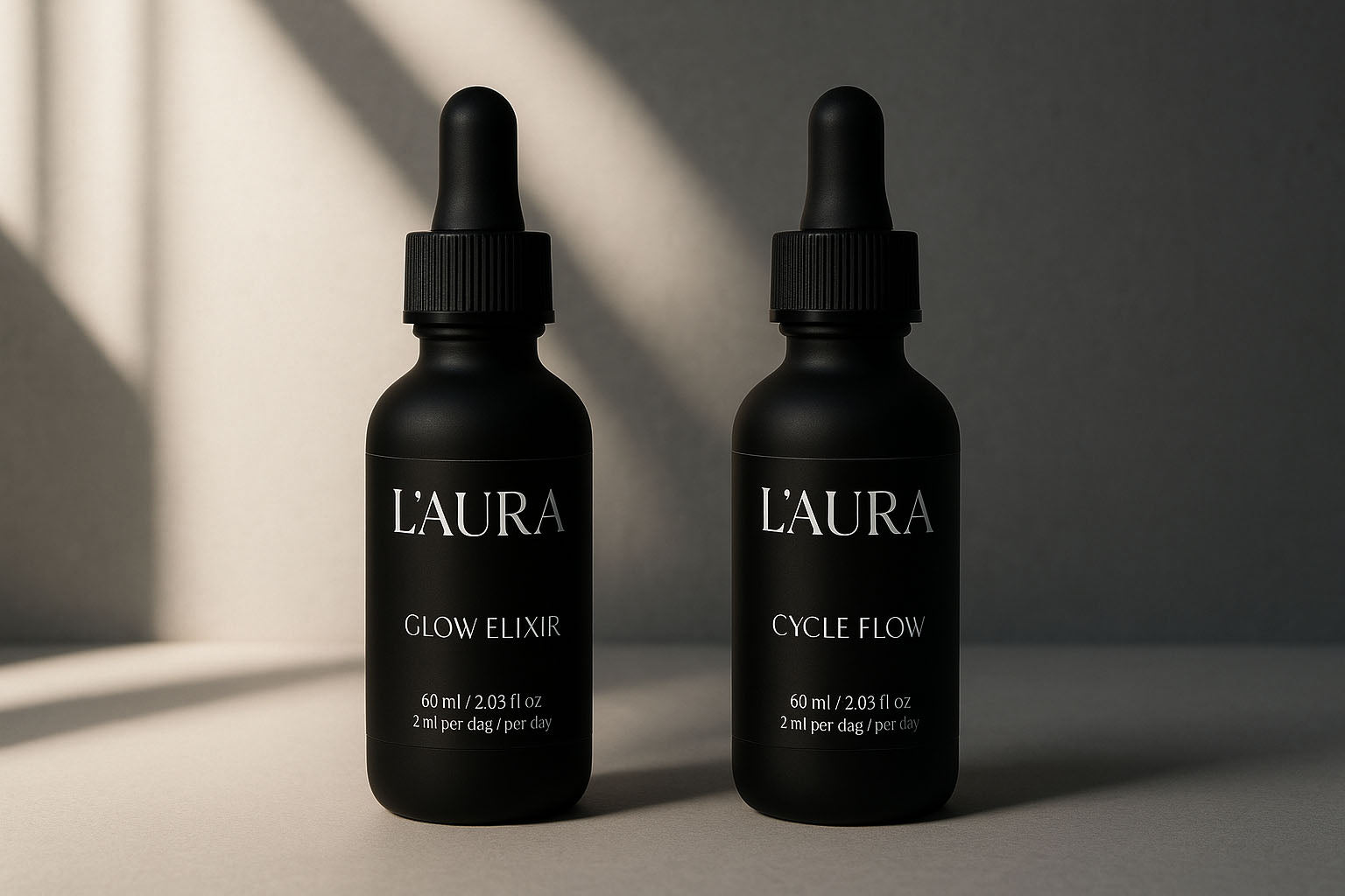 2 L'AURA bottles on counter with sunlight product shot
